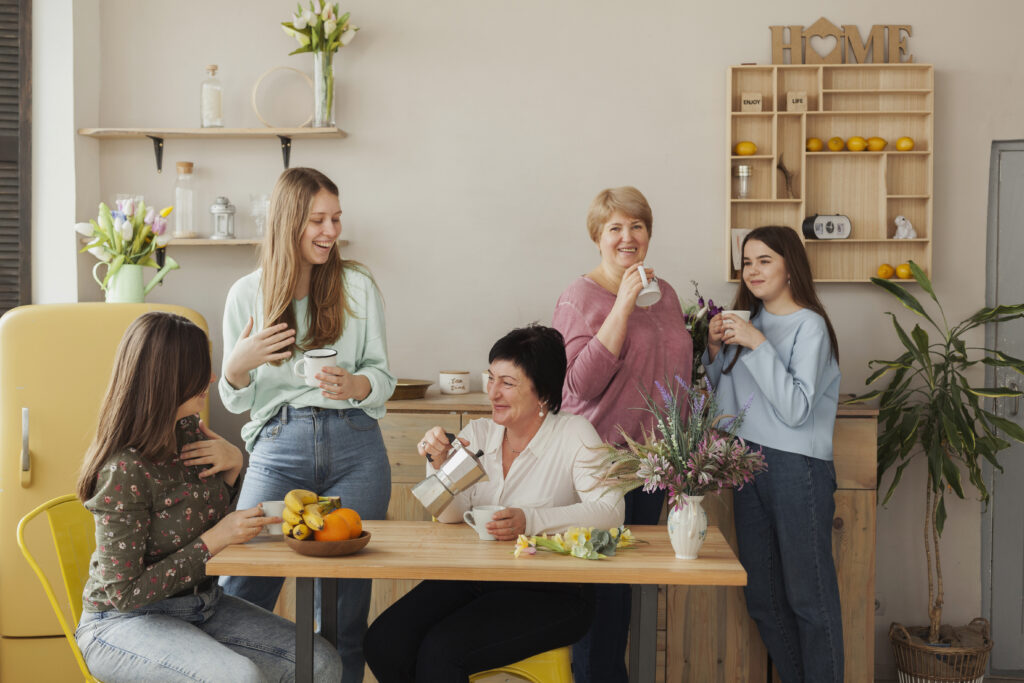 A diverse group of women discussing cultural and generational perspectives on lifestyle choices.